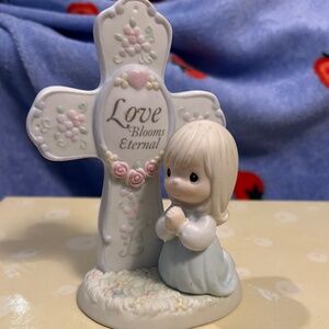 LOVE BLOOMS ETERNAL © 1994 Precious Moments, Inc Licensee Enesco Corporation